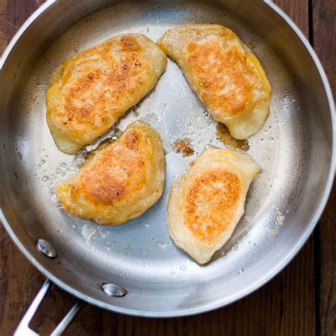 brown-butter-seared-potato-and-cheese-pierogi image