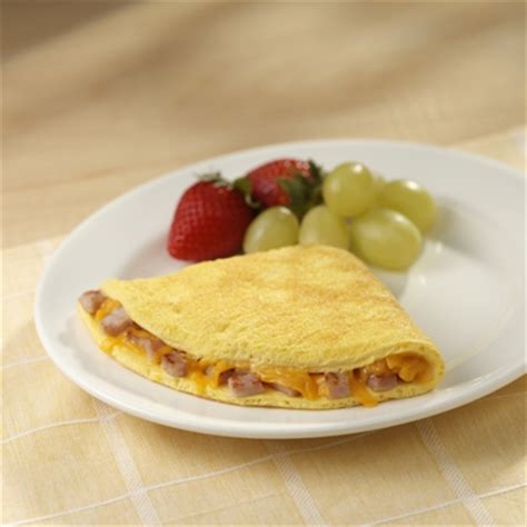 canadian-bacon-and-cheddar-cheese-omelet-ready image