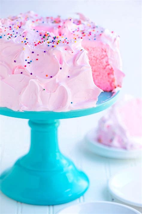 pink-angel-food-cake-with-marshmallow-frosting image