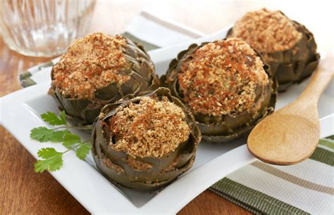 slow-cooker-stuffed-artichokes-the-daily-meal image