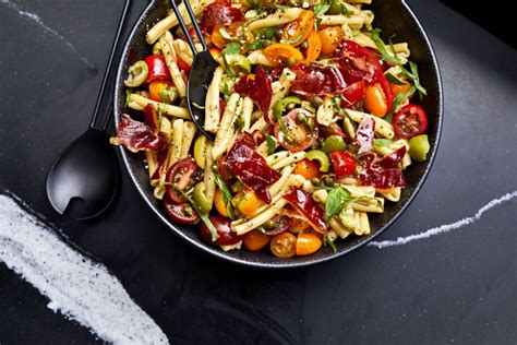 warm-puttanesca-pasta-salad-recipe-ann-taylor-pittman image