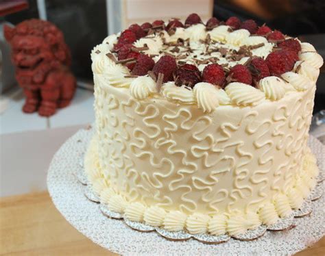 raspberry-and-chocolate-ganache-cake-with-white image