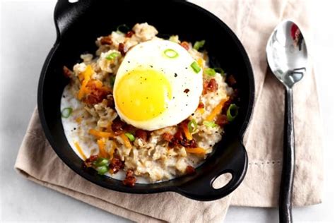savory-oatmeal-with-soft-cooked-egg-bacon-ate image