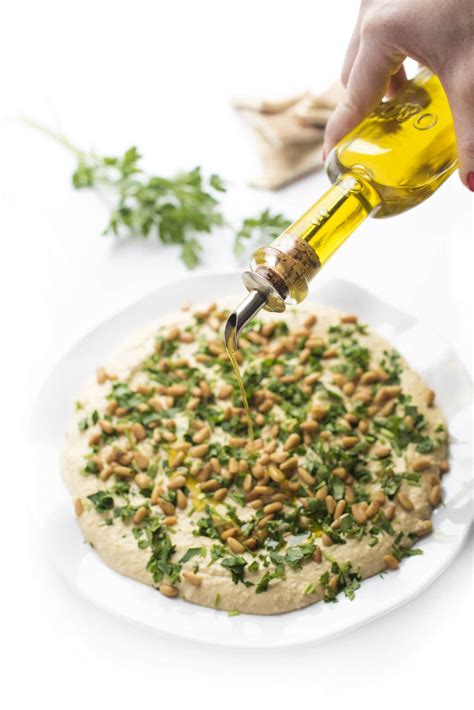 classic-hummus-with-toasted-pine-nuts-the-lemon image