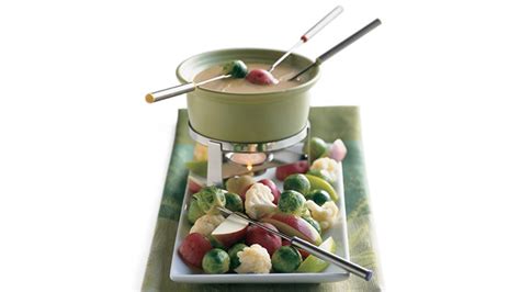 irish-cheddar-and-stout-fondue-recipe-bon-apptit image