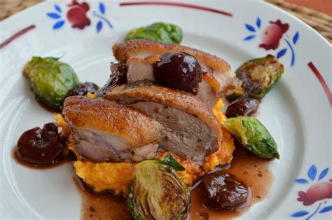 crispy-duck-breasts-with-balsamic-cherry-sauce-roasted-brussels image
