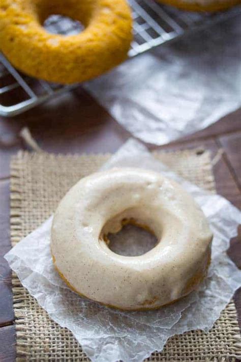 baked-pumpkin-donuts-with-cream-cheese-frosting image