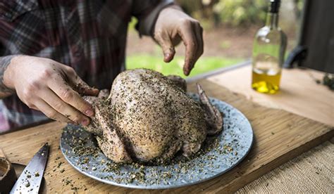 crispy-herb-beer-can-chicken-green-mountain-grills image
