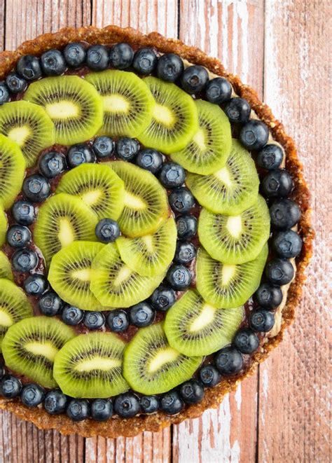 raw-blueberry-and-kiwi-tart-blissful-basil image