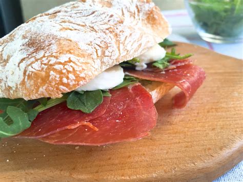 prosciutto-ham-mozzarella-arugula-panini-sandwich image