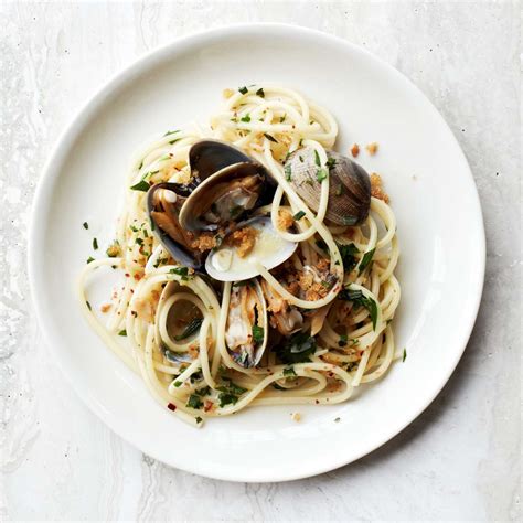 spaghetti-with-clams-and-crispy-bread-crumbs-recipe-food image