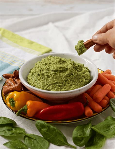 spinach-artichoke-hummus-family-food-on-the-table image