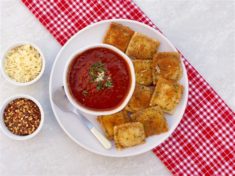 fried-ravioli-is-a-crispy-appetizer-with-a-warm-cheese image