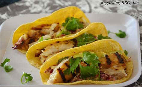 halibut-tacos-with-spicy-radicchio-avocado-slaw image