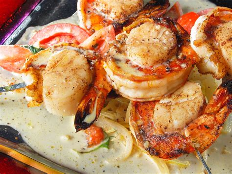 seafood-brochettes-with-tomato-basil-champagne image