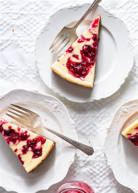 easy-cranberry-swirl-cheesecake-recipe-fork-knife image