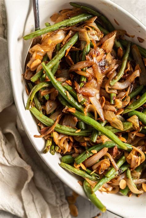 sauted-green-beans-with-garlic-and-onions-running image