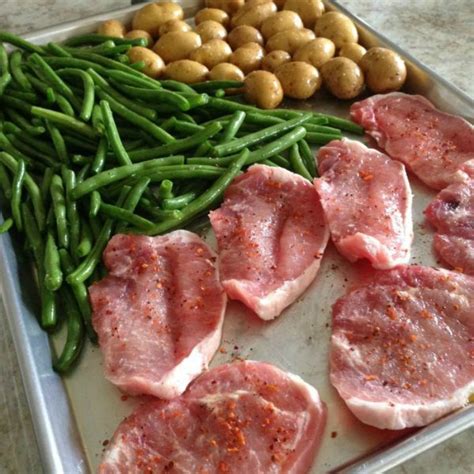 baked-thin-pork-chops-and-veggies-sheet-pan-dinner image