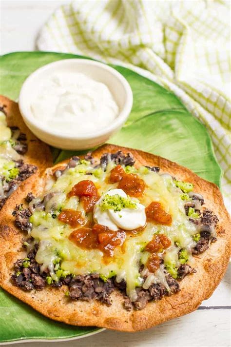 cheesy-broccoli-and-black-bean-tostadas-family-food image