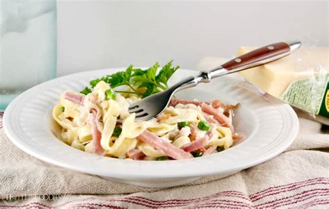 rich-and-creamy-fettuccine-alfredo-with-ham-and-peas image