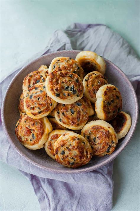 puff-pastry-pinwheels-with-olives-and-sun-dried-tomatoes image