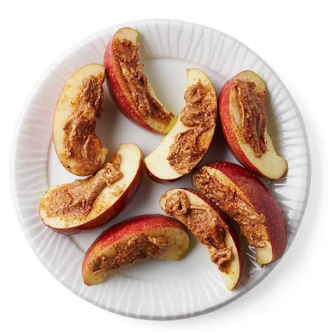 apple-with-cinnamon-almond-butter-eatingwell image