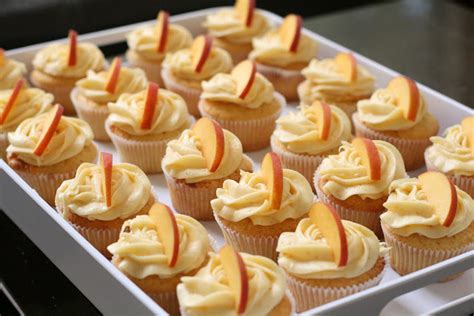peach-cupcakes-with-peach-cream-cheese-frosting image