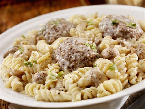 meatball-mac-and-cheese-is-a-hearty-recipe-the-spruce image