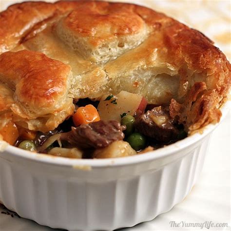 individual-english-beef-pot-pies-with-puff-pastry-the image