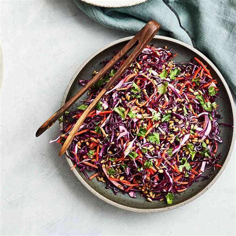 carrot-and-cabbage-slaw-with-sunflower-seeds image