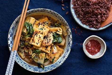 braised-tofu-and-escarole-stir-fry-with-bhutan-red-rice image