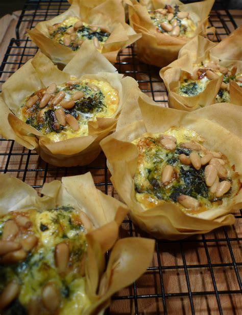 spinach-feta-and-pine-nut-tart-and-tartlets-type-1 image
