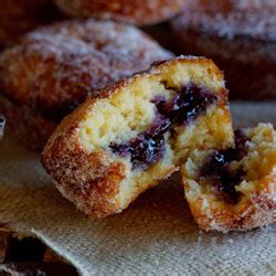 baked-doughnut-muffins-with-blueberry-jam-simply image