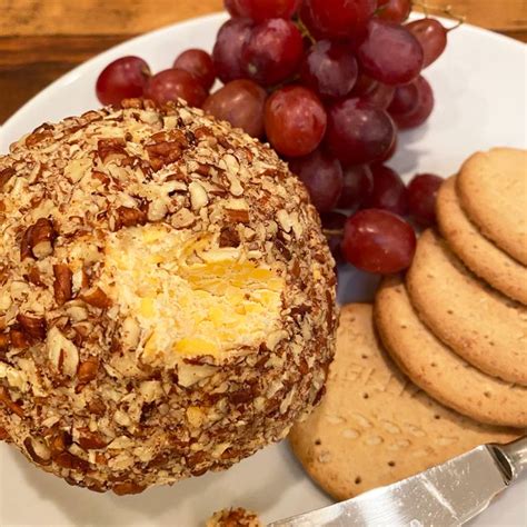 festive-pecan-cheese-ball-recipe-the-spruce-eats image