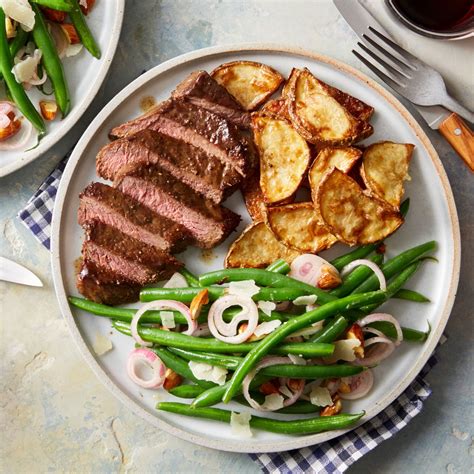 fennel-spiced-steaks-with-garlic-roasted-potato image