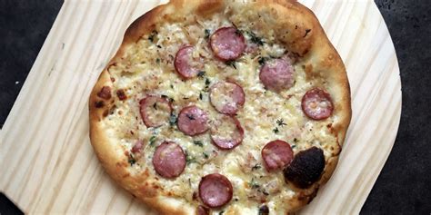 polish-sausage-sauerkraut-pizza-andrew-zimmern image
