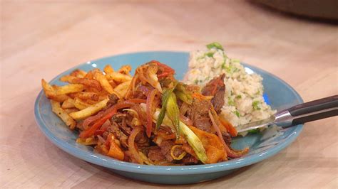 peruvian-style-beef-stir-fry-with-rice-and-fries-rachael-ray image
