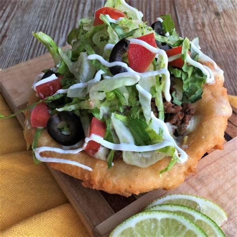 fry-bread-tacos-with-spicy-beef-green-chile-queso image