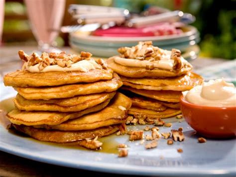 carrot-cake-pancakes-with-maple-cream-cheese-drizzle image