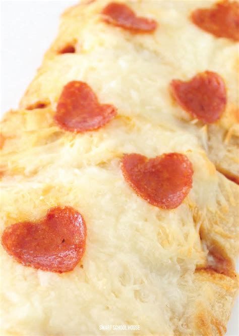 valentines-day-pizza-with-heart-shaped-pepperoni image