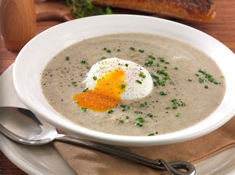 creamed-mushroom-soup-with-poached-egg-thyme image