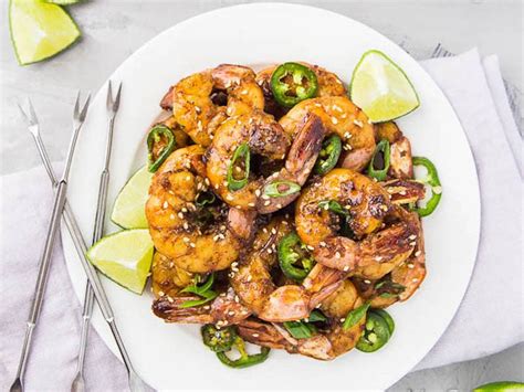 sticky-spicy-sweet-skillet-shrimp-honest-cooking image