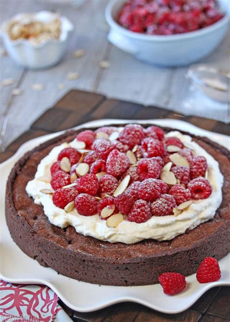 chocolate-raspberry-almond-truffle-tart-sugarhero image