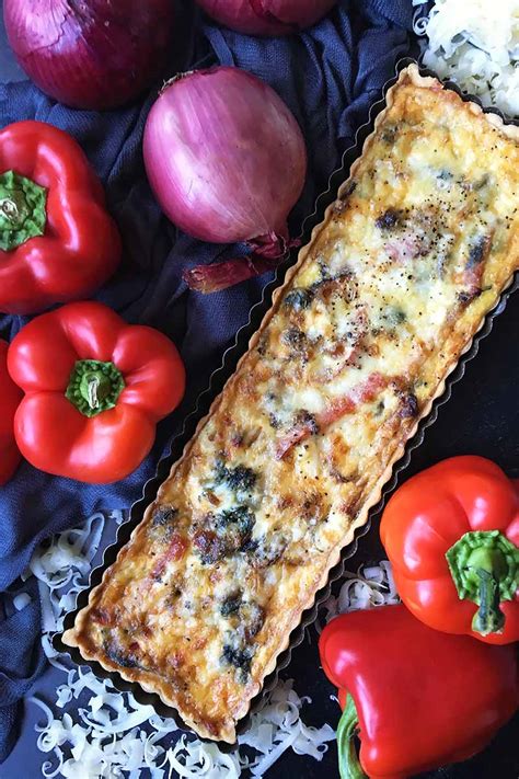 gruyere-quiche-with-caramelized-red-pepper-and-onion image