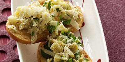artichoke-parmesan-crostini-recipe-delish image