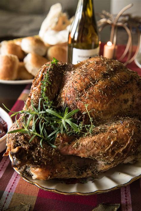 juicy-white-wine-and-herb-roasted-turkey-the-crumby-kitchen image