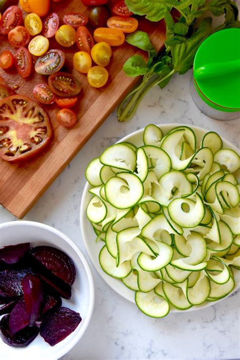 tomato-beet-and-zucchini-salad-with-basil-vinaigrette image