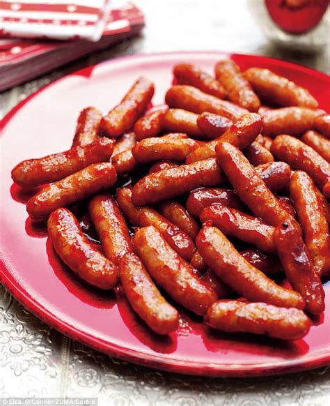 nigellas-cranberry-and-soy-glazed-cocktail-sausages image
