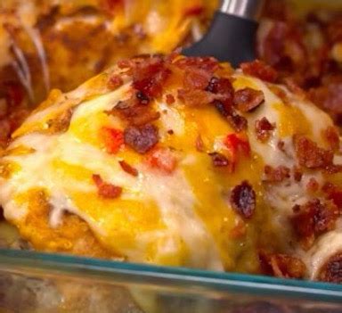 four-cheese-bacon-stuffed-smothered-chicken-casserole image