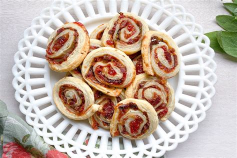 tomato-jam-bacon-pinwheels-in-the-curious-kitchen image